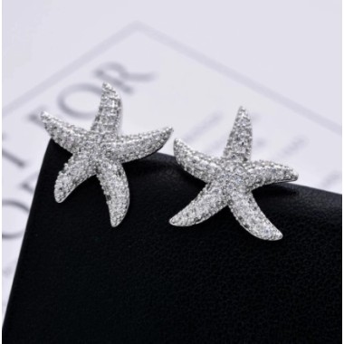 PENDIENTES ESTRELLA DE MAR CON ORO BLANCO 18 K
