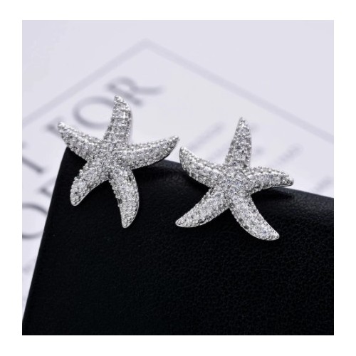 PENDIENTES ESTRELLA DE MAR CON ORO BLANCO 18 K