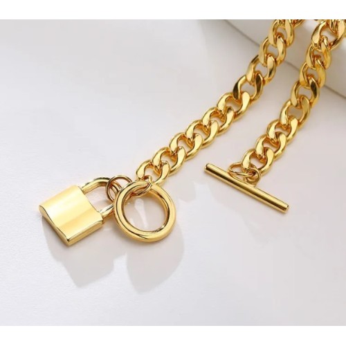 PULSERA CANDADO ACERO Y ORO