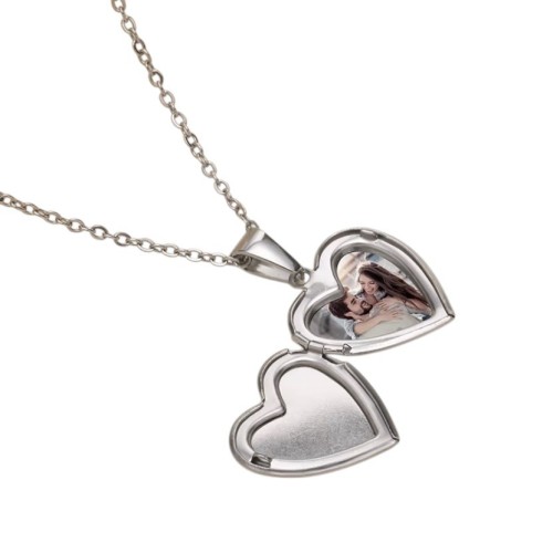 COLGANTE RELICARIO CORAZÓN NÁCAR ACERO Y ORO