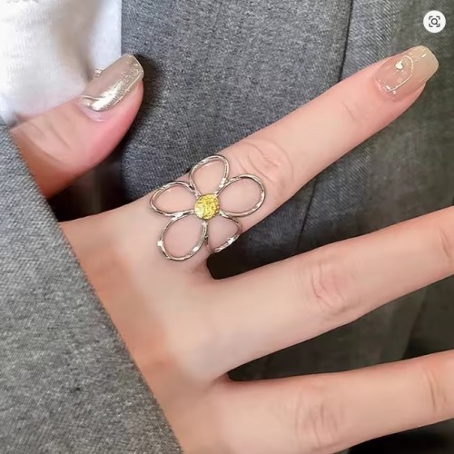 ANILLO FLOR CALADA ACERO BICOLOR AJUSTABLE